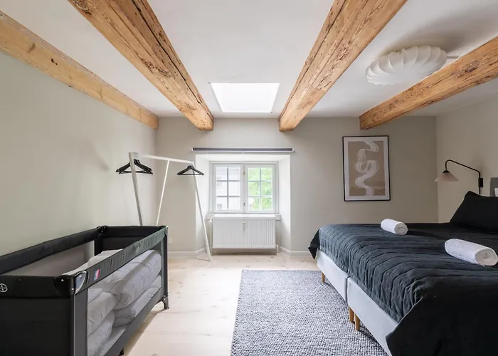 With Exposed Ceiling Beams